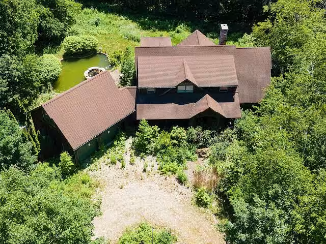 2 of 3 skeletal remains found in Burlington home identified as mother and son, officials say