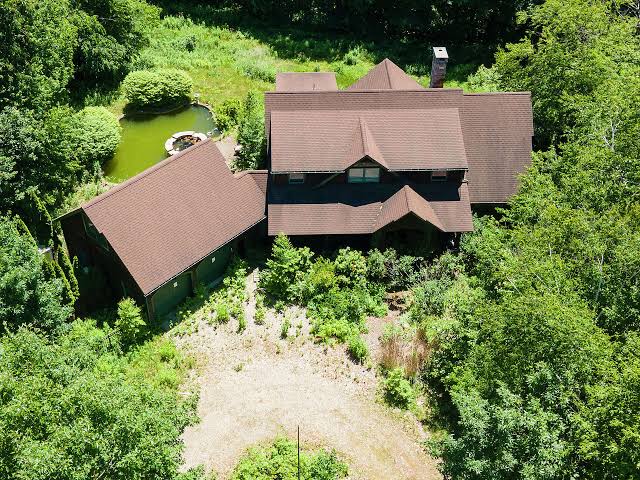 2 of 3 skeletal remains found in Burlington home identified as mother and son, officials say